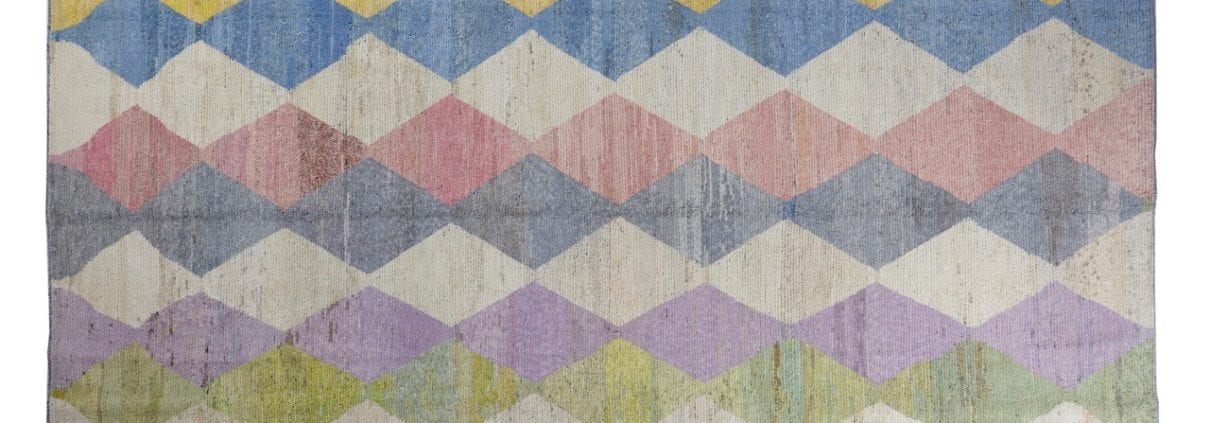 large handwoven rug harlequin design