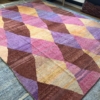 large handwoven rug with colourful harlequin pattern in 255x355cm